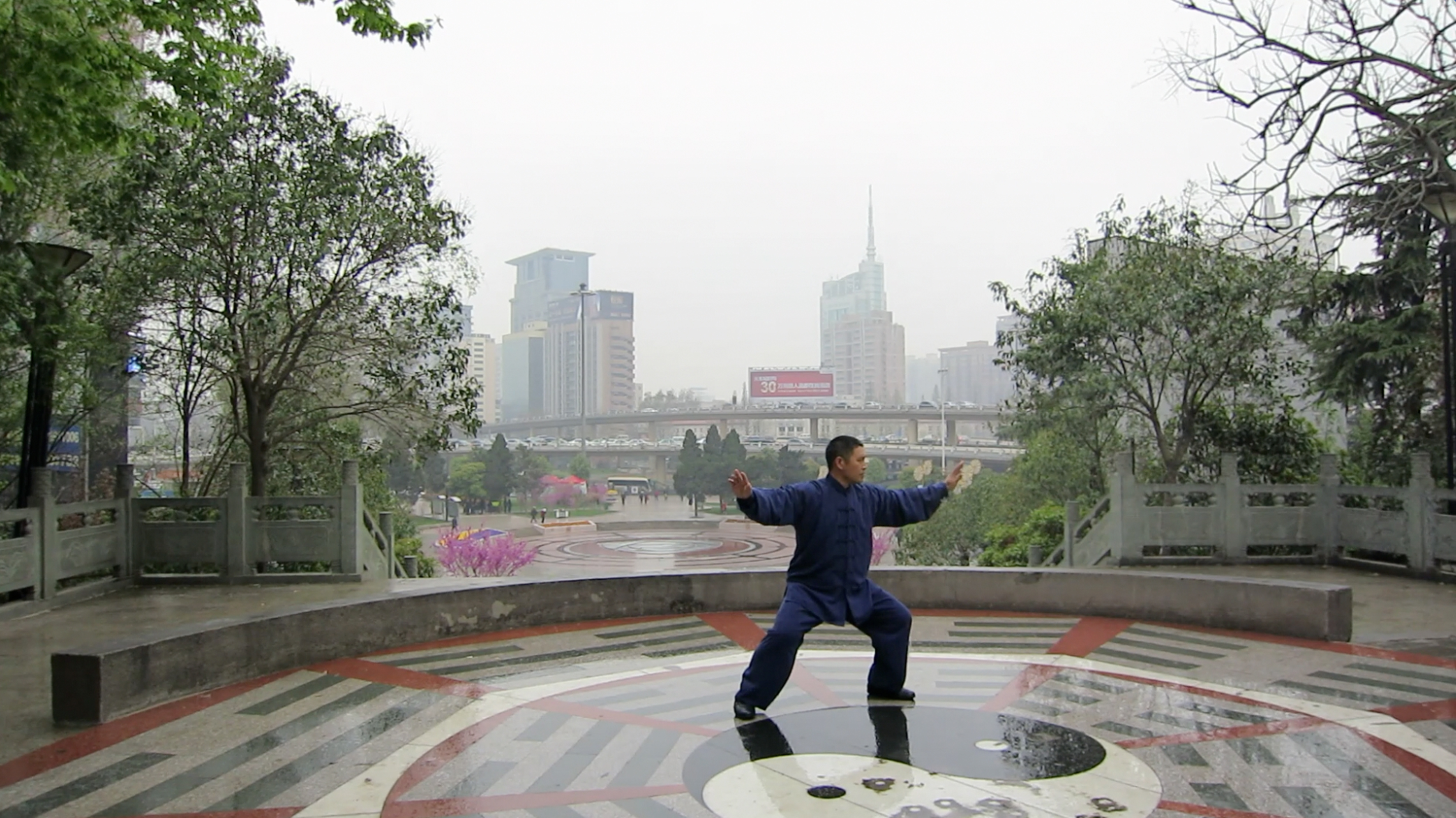 Shifu Liu practices on a wet morning in China
